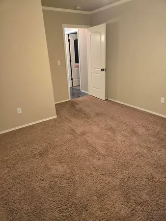 a view of a backyard with sitting area