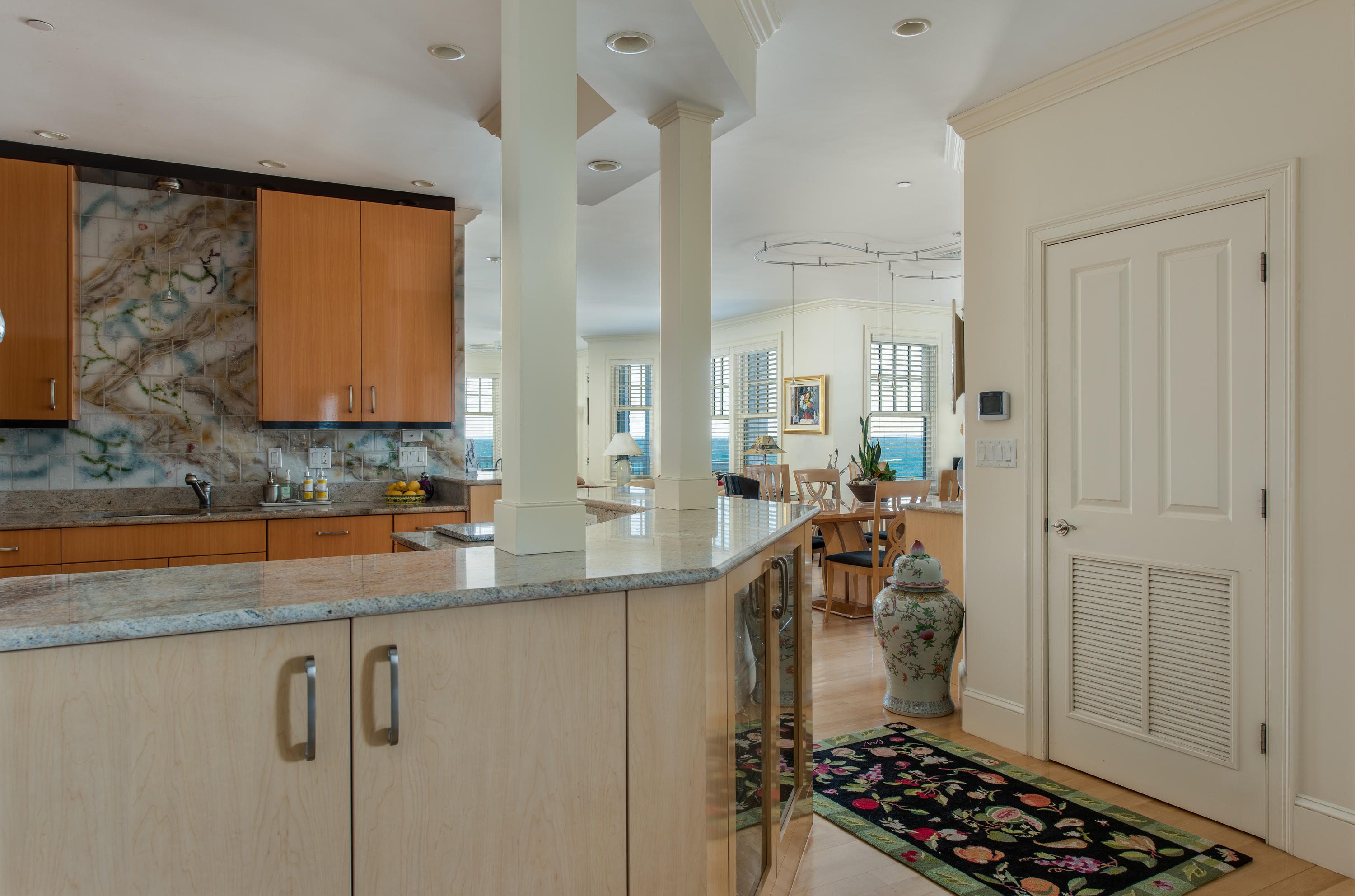 28 Cape Codder Road, Unit 109BU Falmouth, MA 02540 - Photo 11 of 20 a kitchen with stainless steel appliances granite countertop a sink stove and cabinets