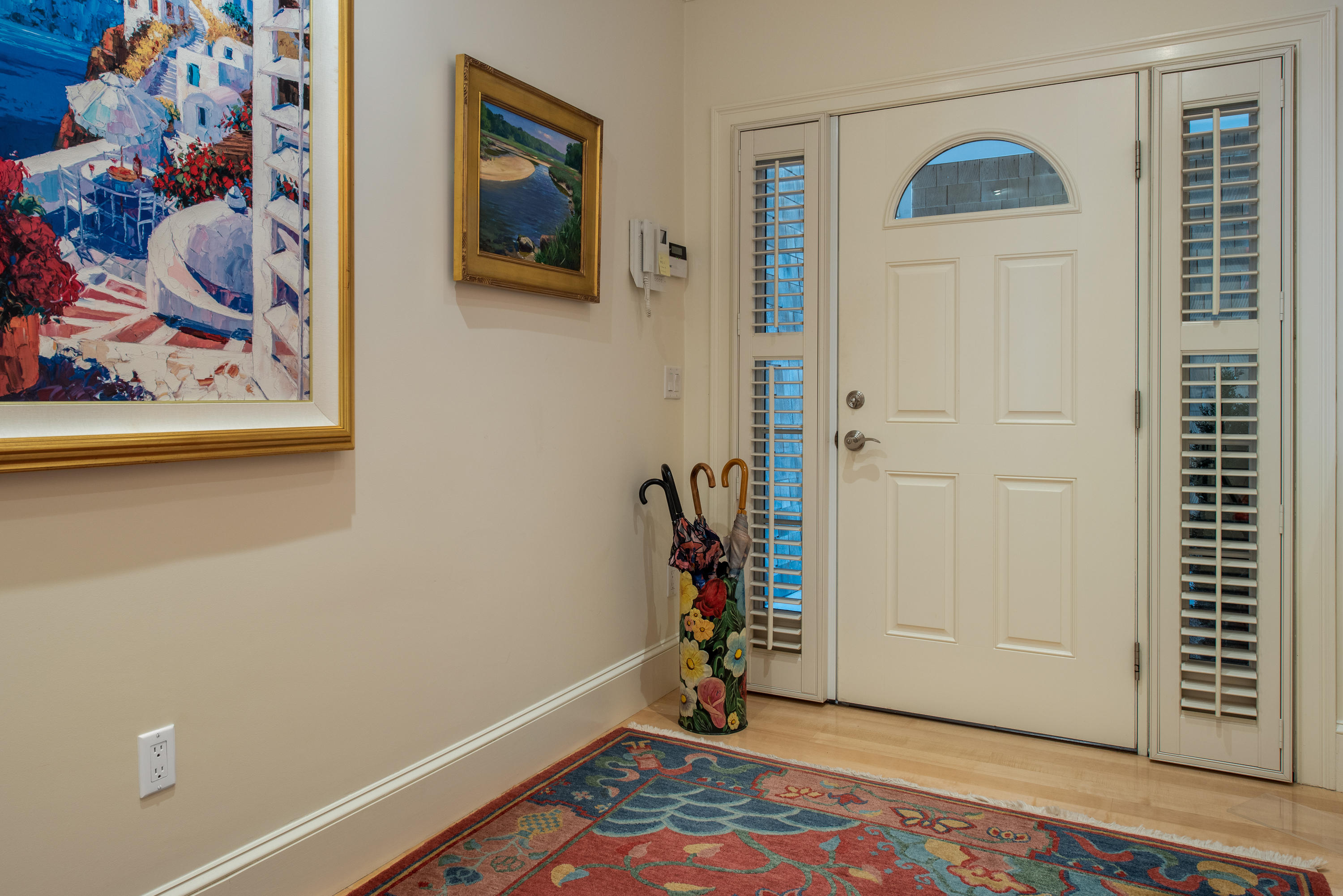 28 Cape Codder Road, Unit 109BU Falmouth, MA 02540 - Photo 4 of 20 a view of a room with wooden floor and cabinet
