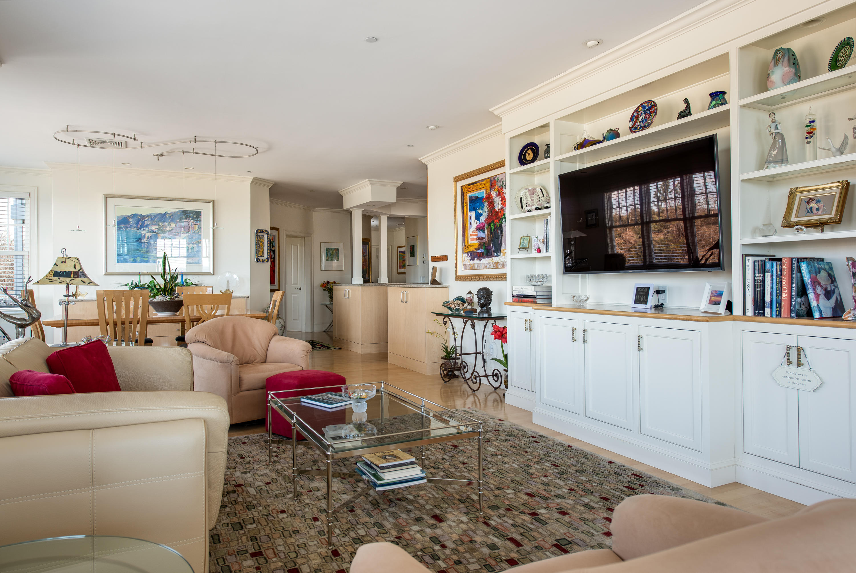 28 Cape Codder Road, Unit 109BU Falmouth, MA 02540 - Photo 9 of 20 a living room with furniture and flat screen tv