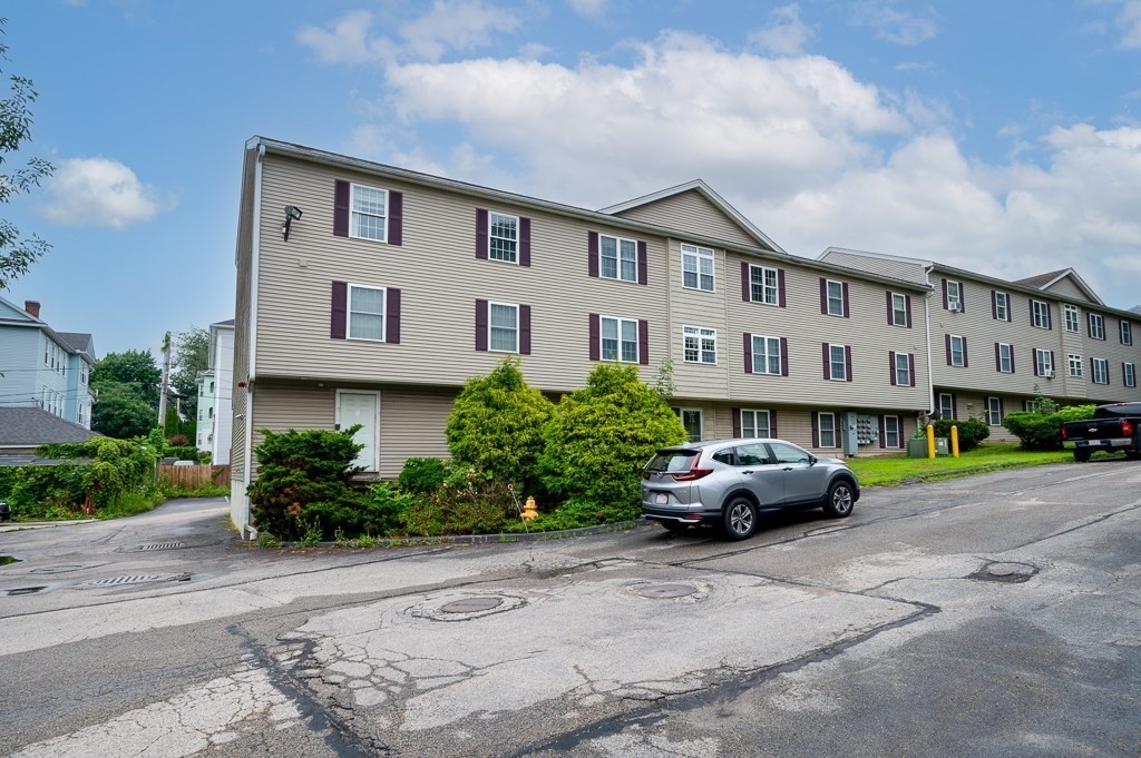 1 Hatfield Street, Unit 3 Worcester, MA 01604 - Photo 3 of 23 a car parked in front of a white building