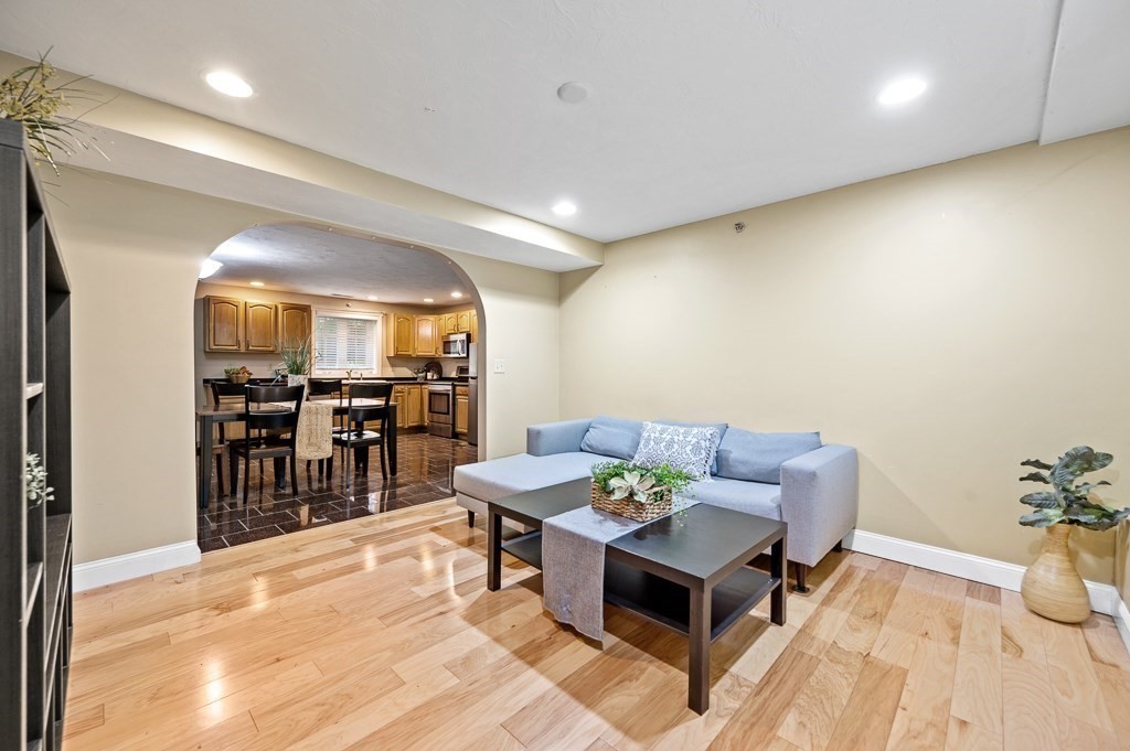 1 Hatfield Street, Unit 3 Worcester, MA 01604 - Photo 5 of 23 a living room with furniture and wooden floor