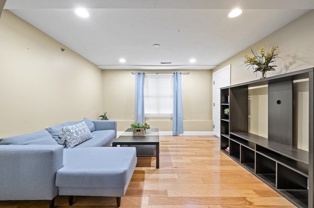 1 Hatfield Street, Unit 3 Worcester, MA 01604 - Photo 6 of 23 a living room with furniture and a flat screen tv