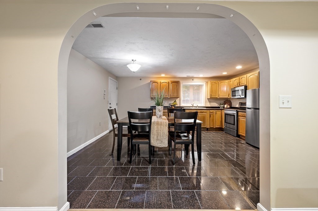 1 Hatfield Street, Unit 3 Worcester, MA 01604 - Photo 7 of 23 a view of a dining area with furniture