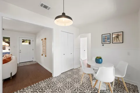 a view of kitchen with furniture and rug
