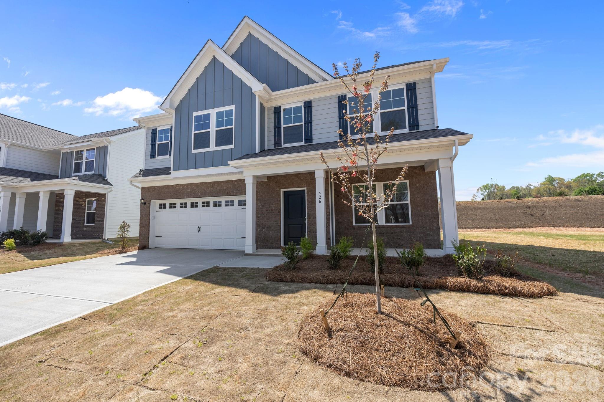 426 Brick House Road York, SC 29745 - Photo 2 of 35 a front view of a house with garden
