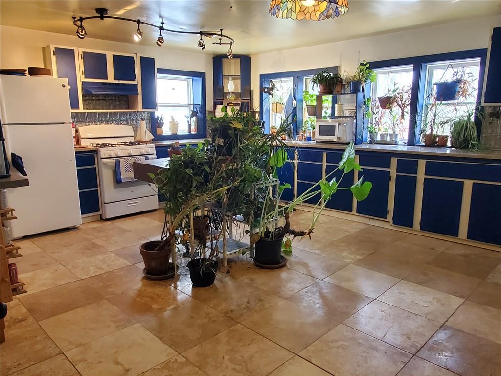 392 Beaver Ridge Road Jasper, GA 30143 - Photo 15 of 55 a view of a chairs and table in a room