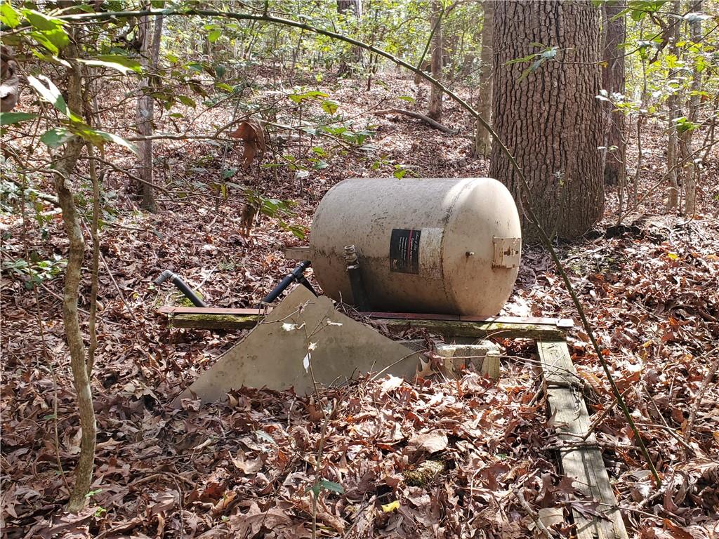 392 Beaver Ridge Road Jasper, GA 30143 - Photo 47 of 55 a view of a wooden fence and a tree