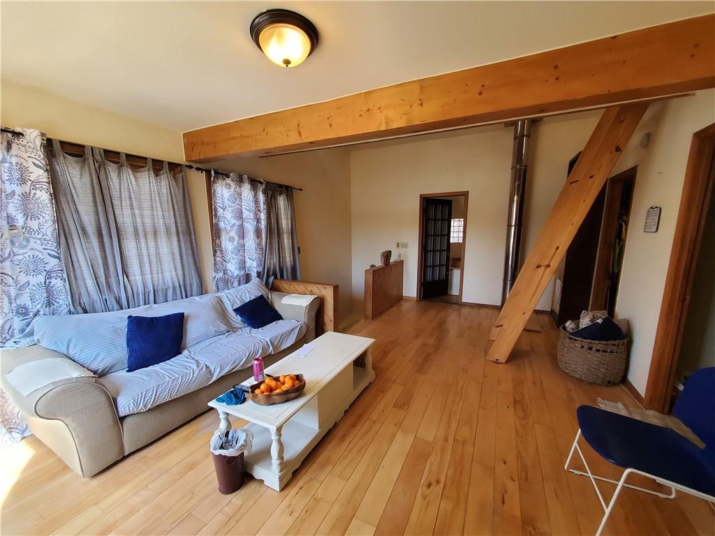 392 Beaver Ridge Road Jasper, GA 30143 - Photo 6 of 55 a living room with furniture and a flat screen tv