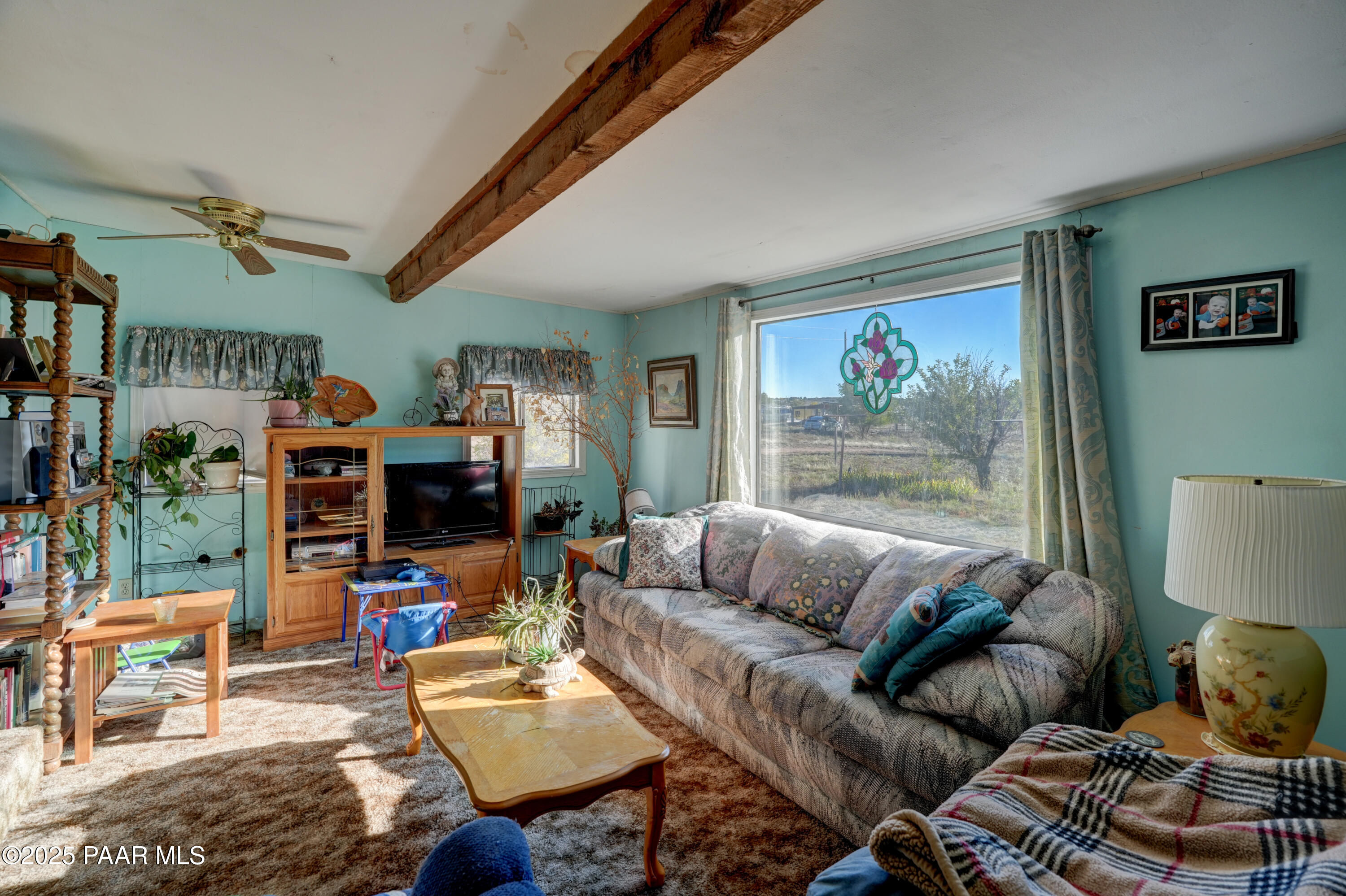 24025 North State Route 89 Paulden, AZ 86334 - Photo 15 of 29 a living room with furniture a rug and a window