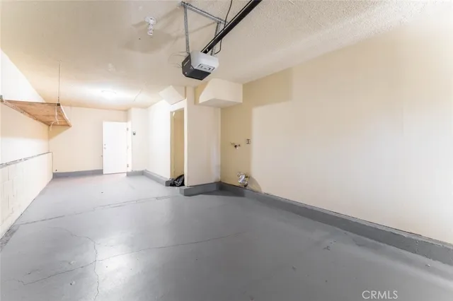 a view of a storage & utility room with wooden floor