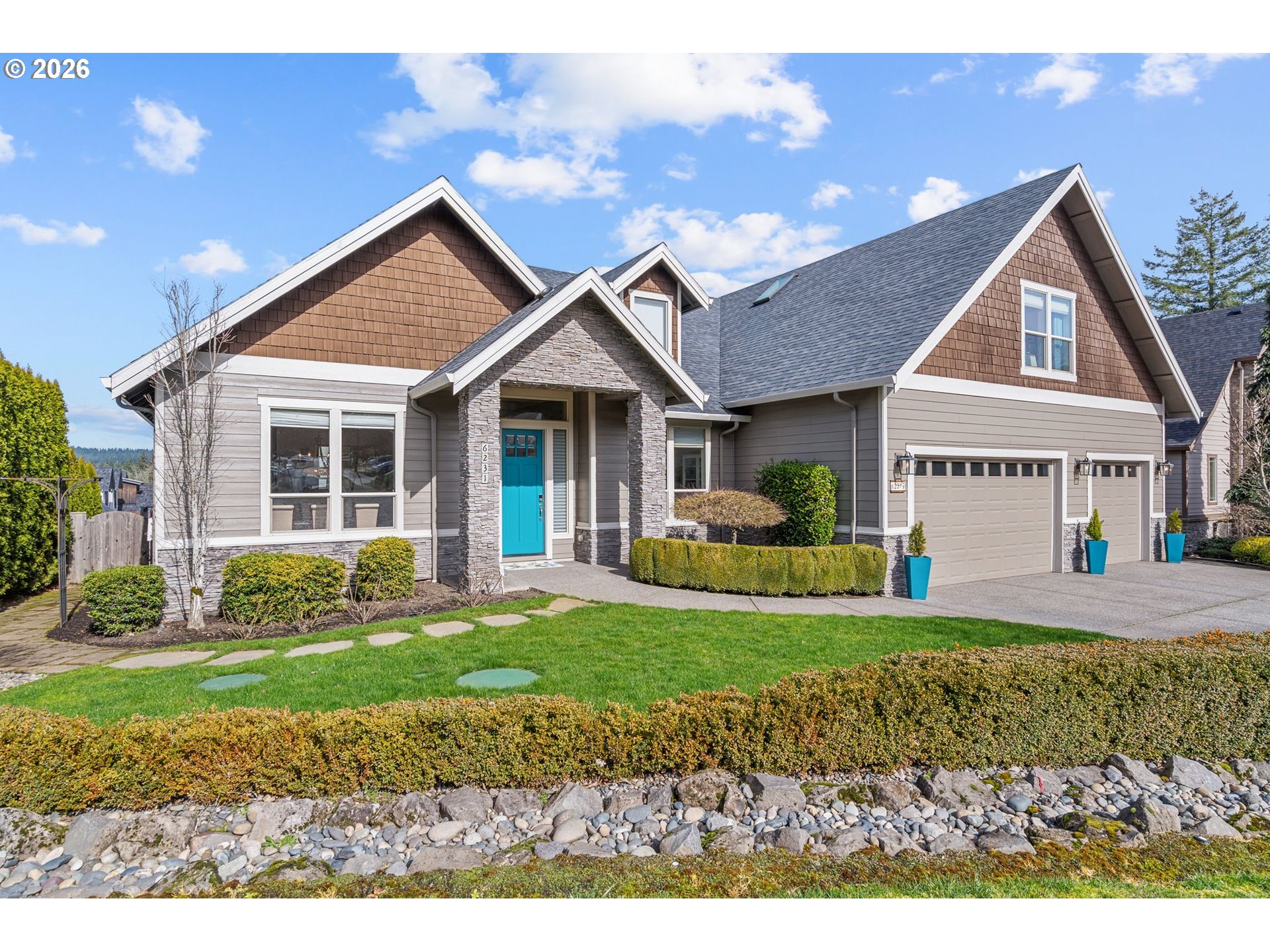 6231 Northwest Klickitat Court Camas, WA 98607 - Photo 1 of 1 a front view of a house with a yard