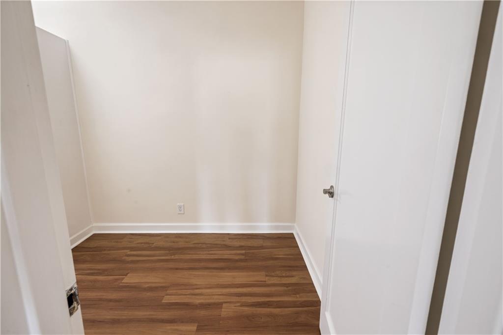 6801 Shore Road, Unit 4J Brooklyn, NY 11220 - Photo 8 of 15 a view of wooden floor