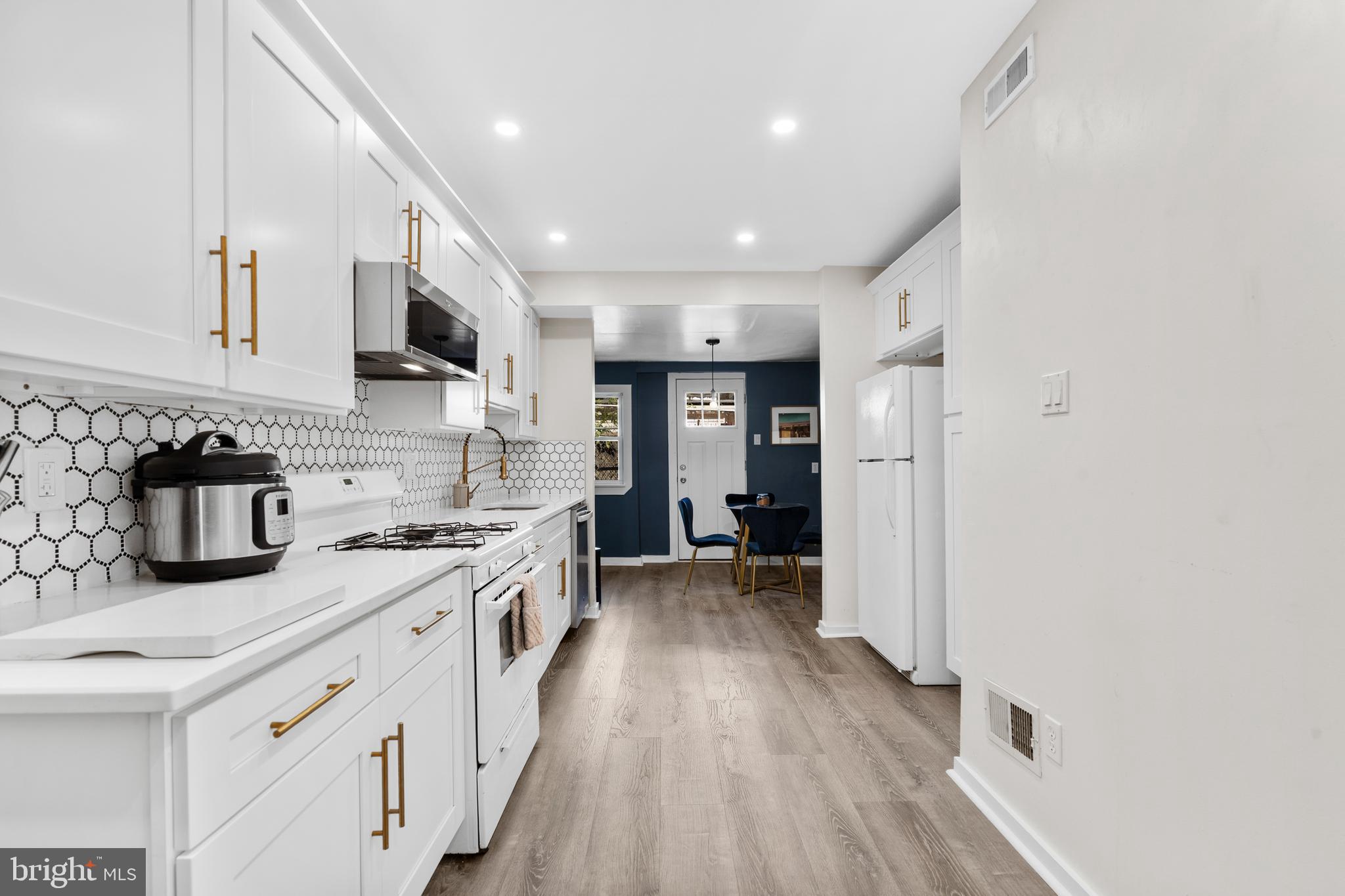 2564 Kern Street Philadelphia, PA 19125 - Photo 1 of 35 a kitchen with stainless steel appliances granite countertop lots of counter top space and cabinets