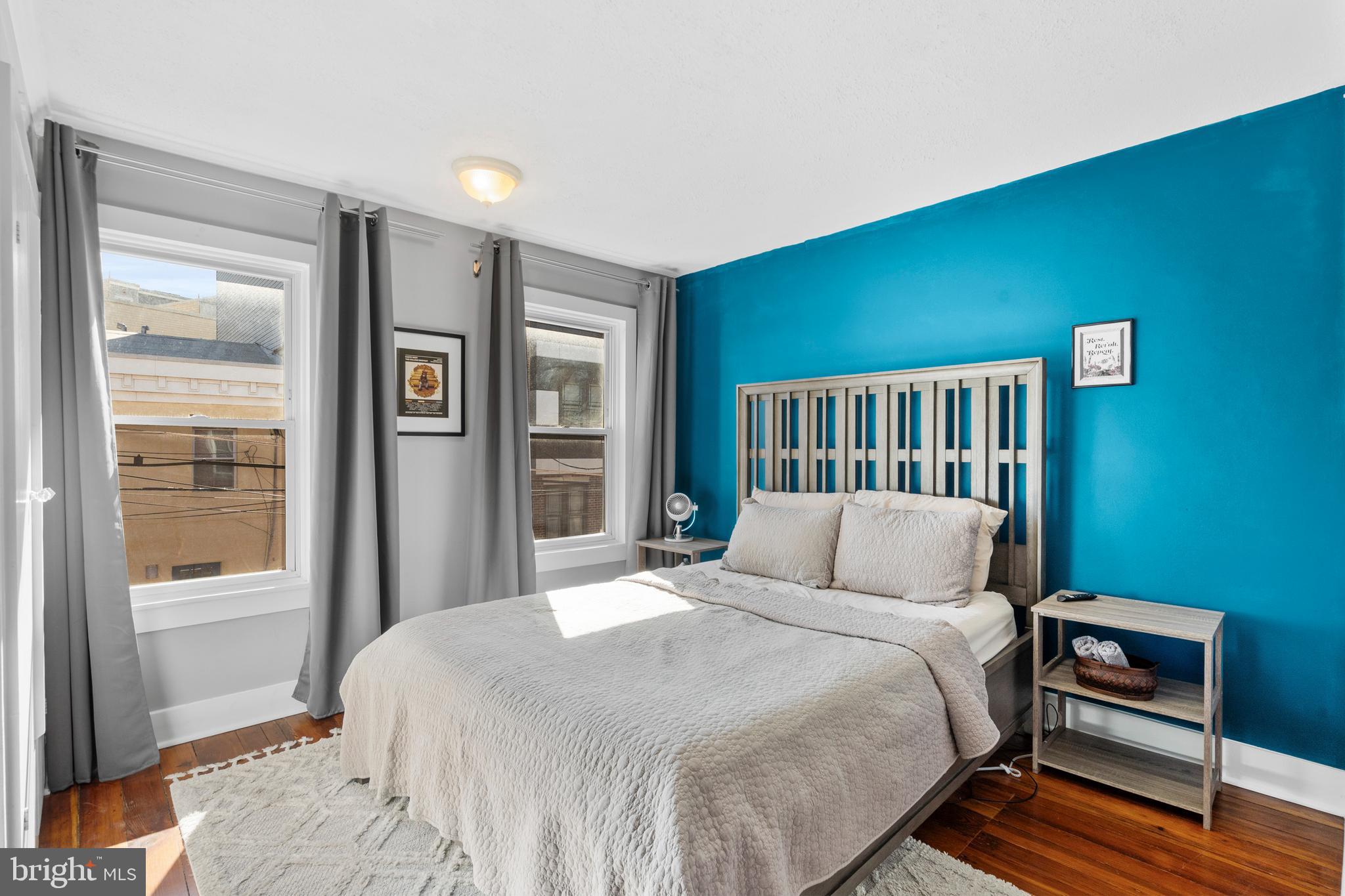 2564 Kern Street Philadelphia, PA 19125 - Photo 17 of 35 a bedroom with a bed and a window