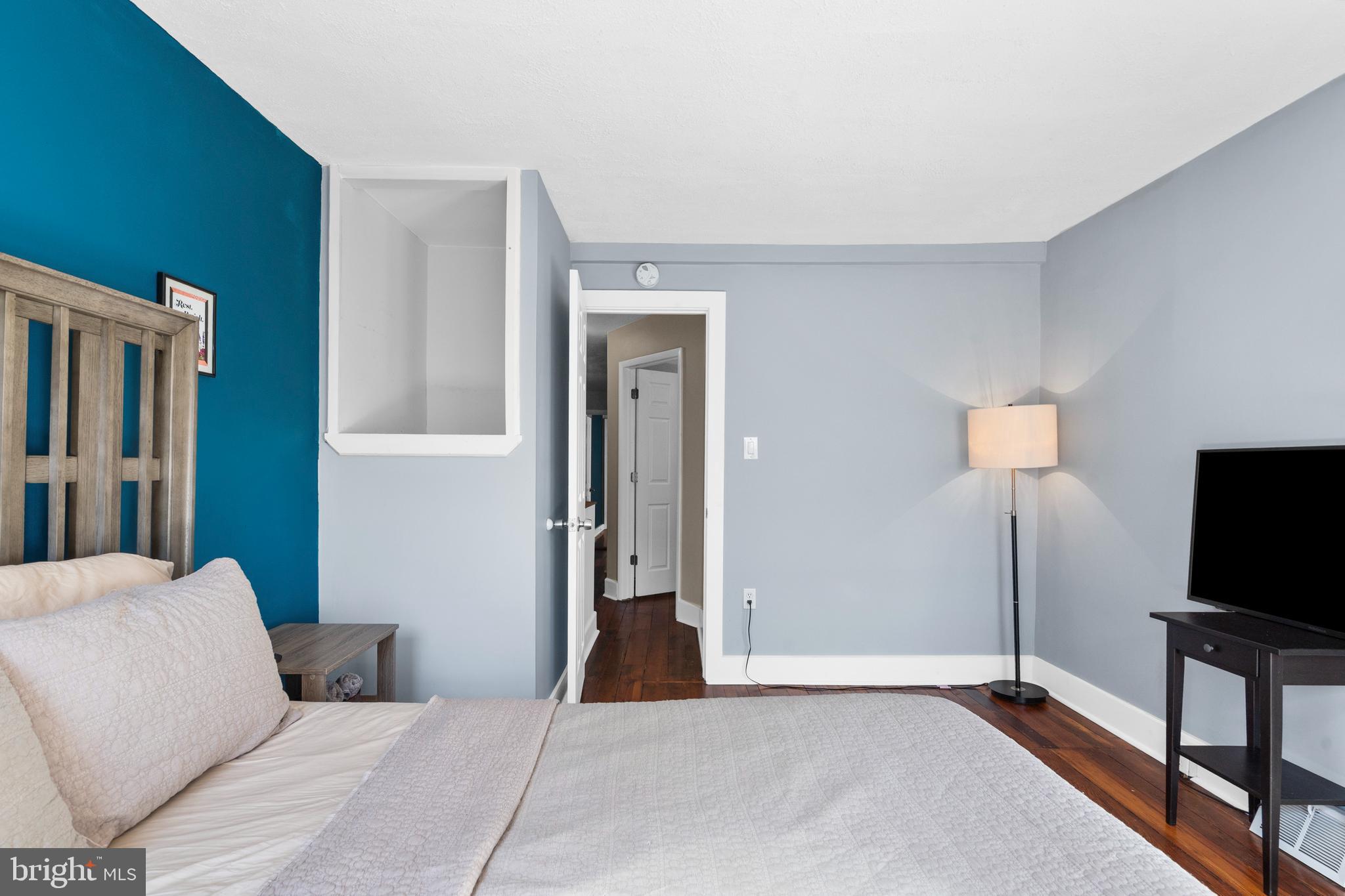 2564 Kern Street Philadelphia, PA 19125 - Photo 18 of 35 a living room with furniture and a flat screen tv