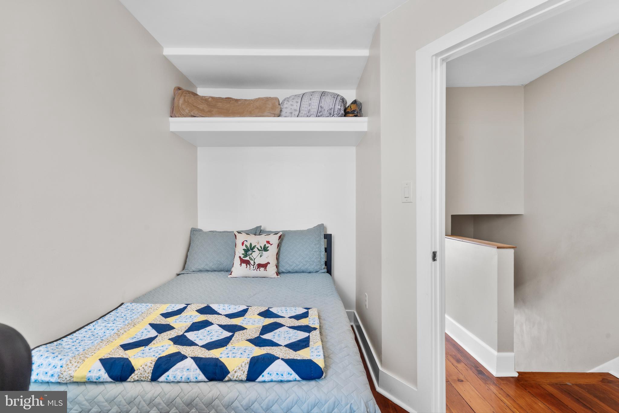 2564 Kern Street Philadelphia, PA 19125 - Photo 21 of 35 a bedroom with a bed and a window