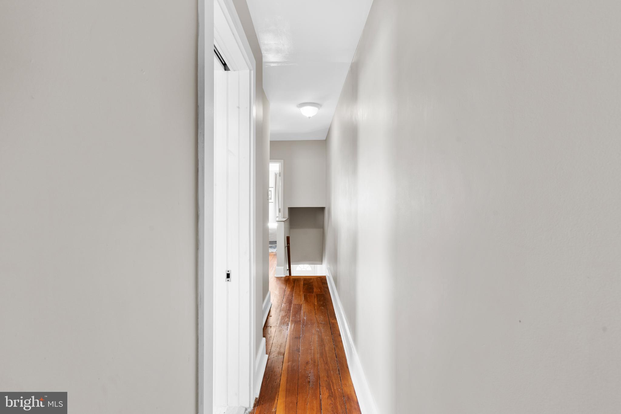 2564 Kern Street Philadelphia, PA 19125 - Photo 25 of 35 a view of a hallway with wooden floor