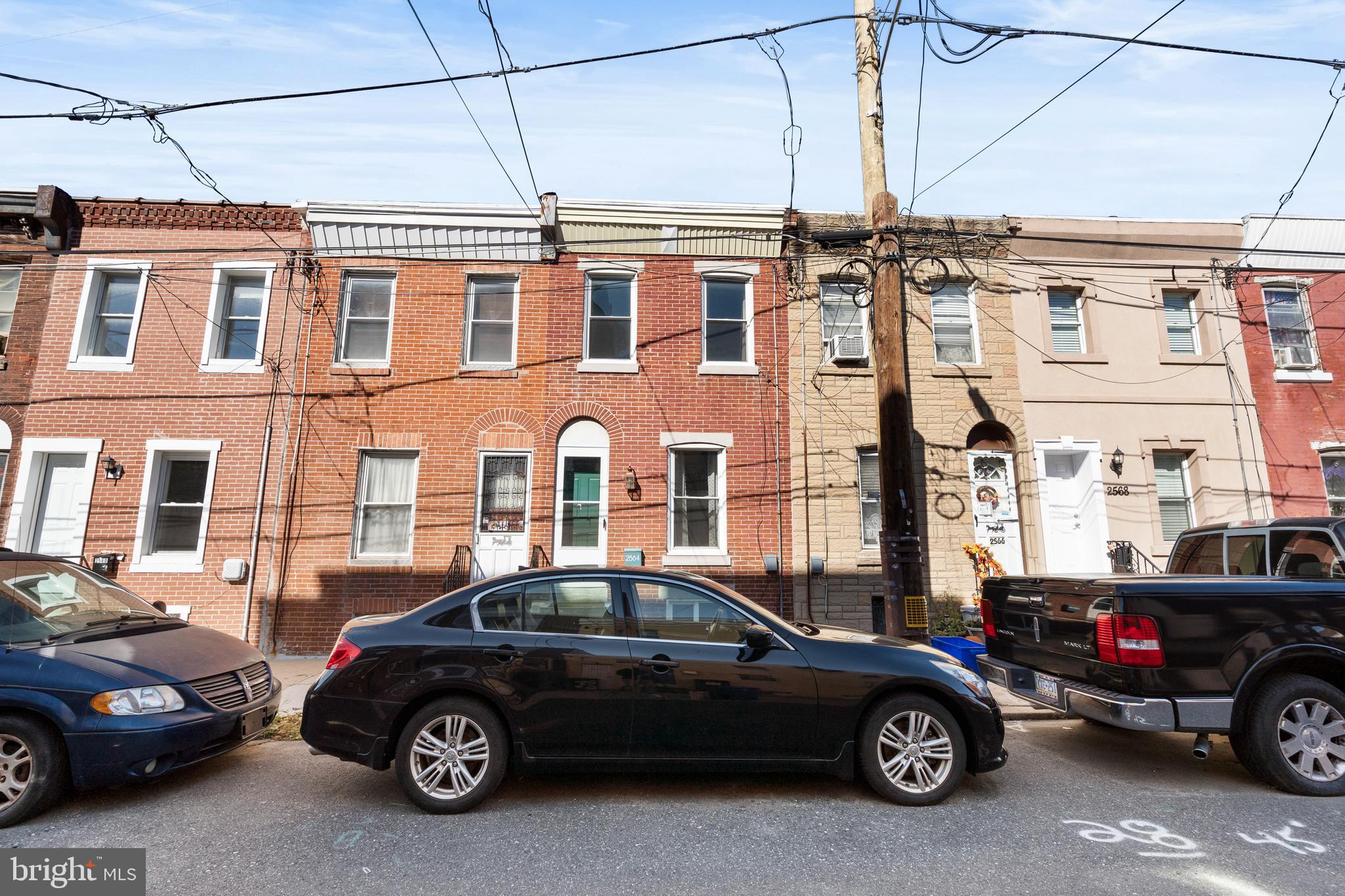 2564 Kern Street Philadelphia, PA 19125 - Photo 29 of 35 a car parked in front of a building