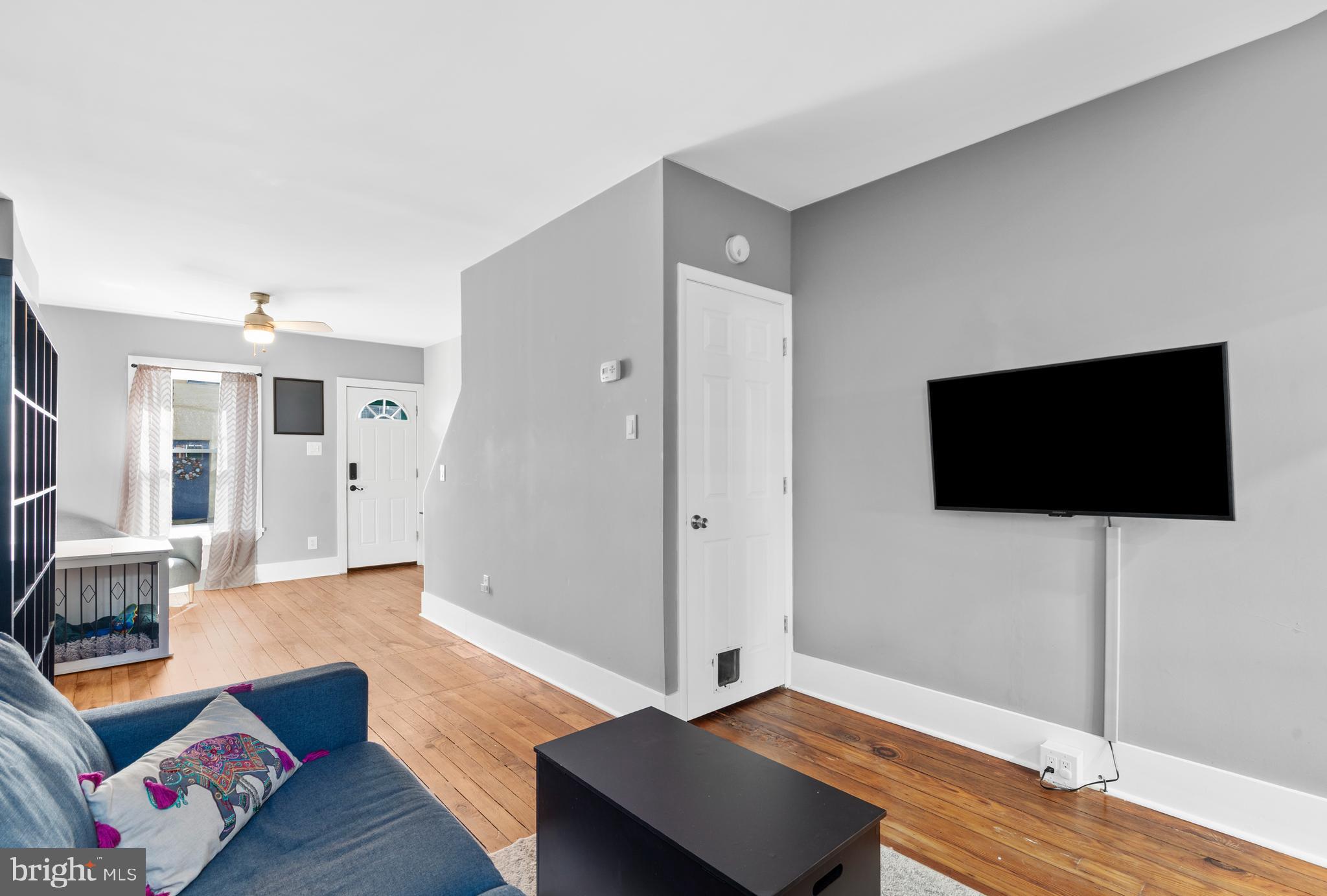 2564 Kern Street Philadelphia, PA 19125 - Photo 6 of 35 a living room with furniture and a flat screen tv