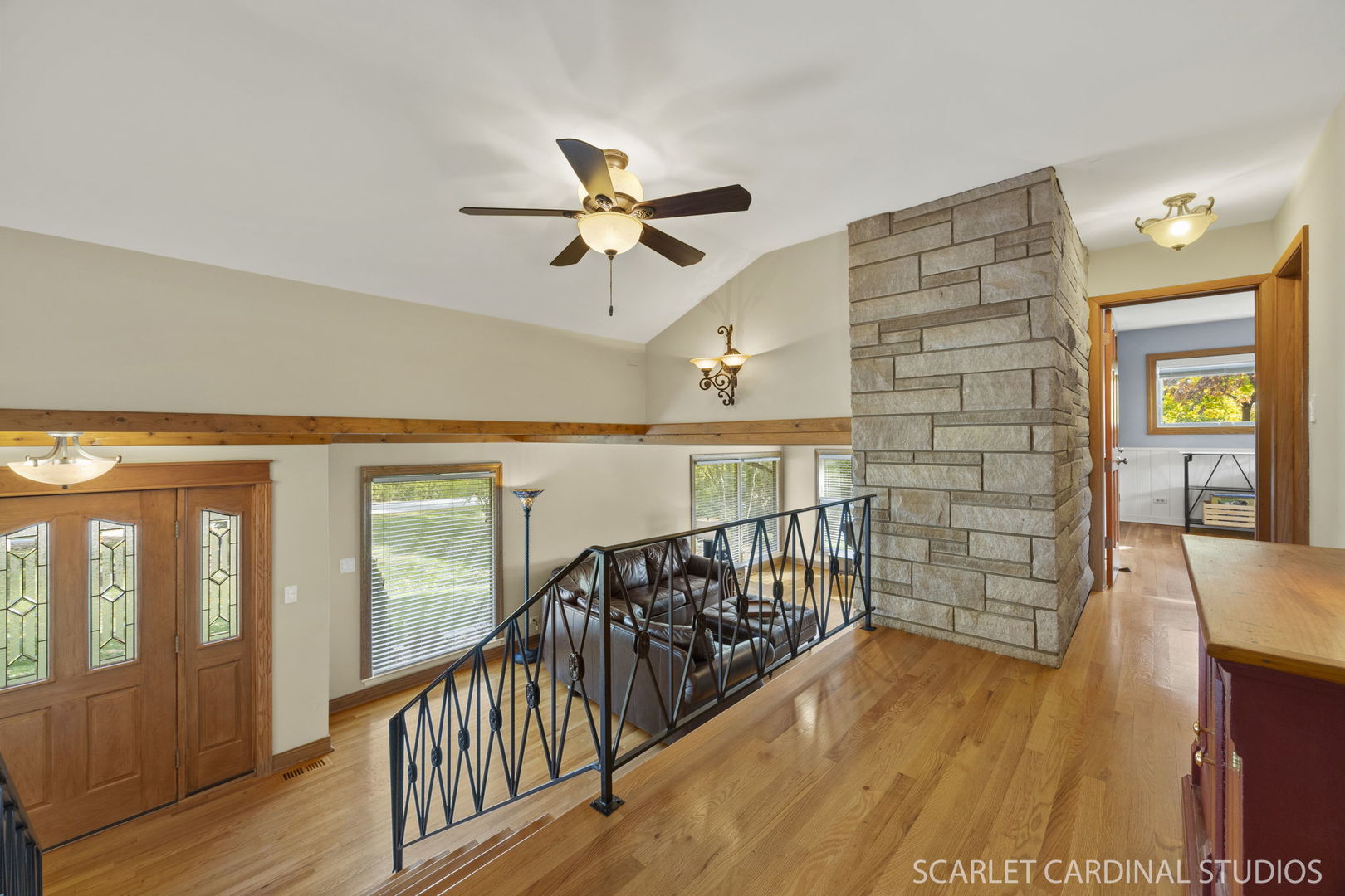 1007 Beau Brummel Drive Sleepy Hollow, IL 60118 - Photo 13 of 35 a view of a hallway with wooden floor and stairs