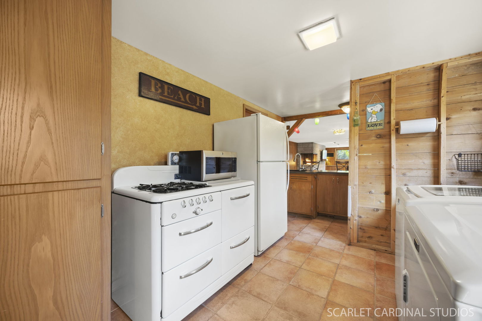 1007 Beau Brummel Drive Sleepy Hollow, IL 60118 - Photo 19 of 35 a kitchen with a stove a refrigerator and a sink