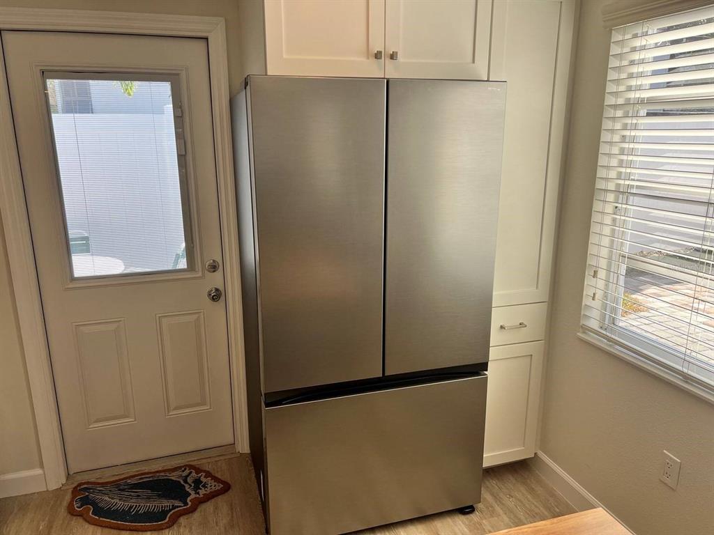 6020 Midnight Pass Road, Unit 45 Sarasota, FL 34242 - Photo 11 of 16 a view of a closet and utility room
