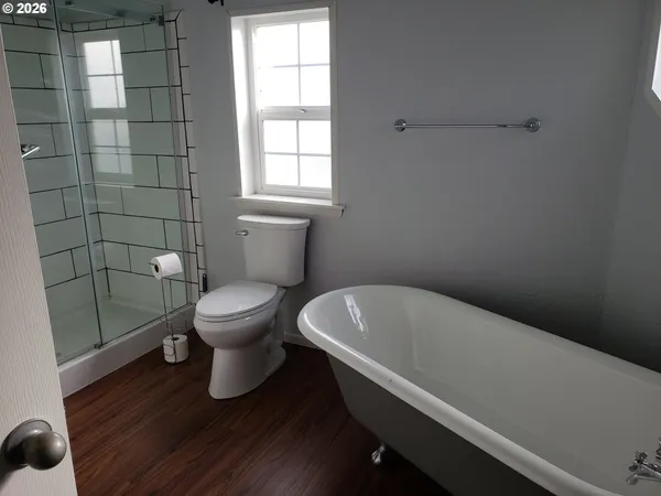 a bathroom with a toilet and a sink