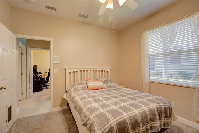 a view of a swimming pool with a yard