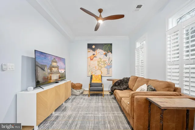 a kitchen with stainless steel appliances granite countertop a sink stove and microwave