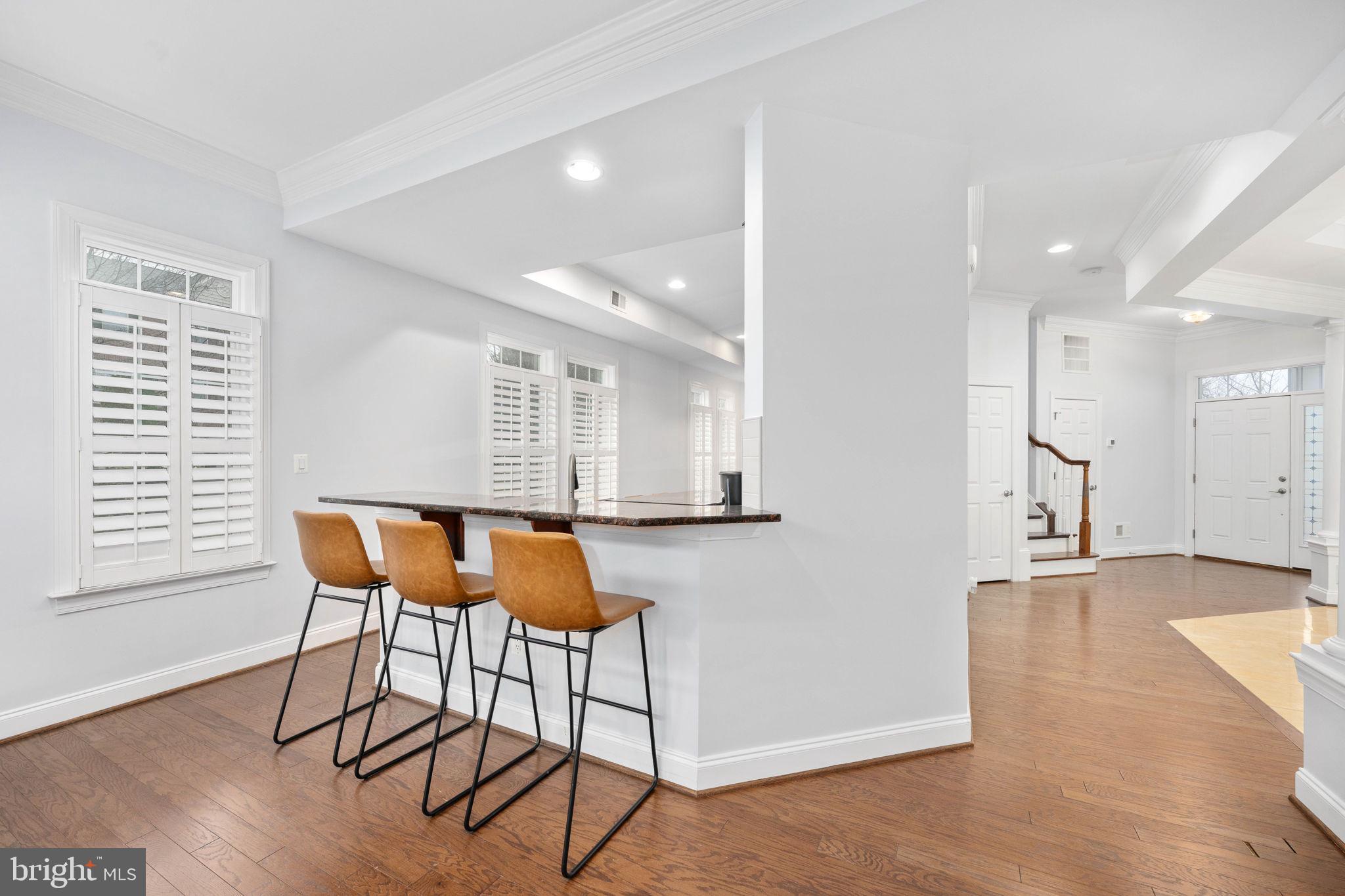 6044 Masondale Road Alexandria, VA 22315 - Photo 18 of 64 a view of an chairs and table in a room