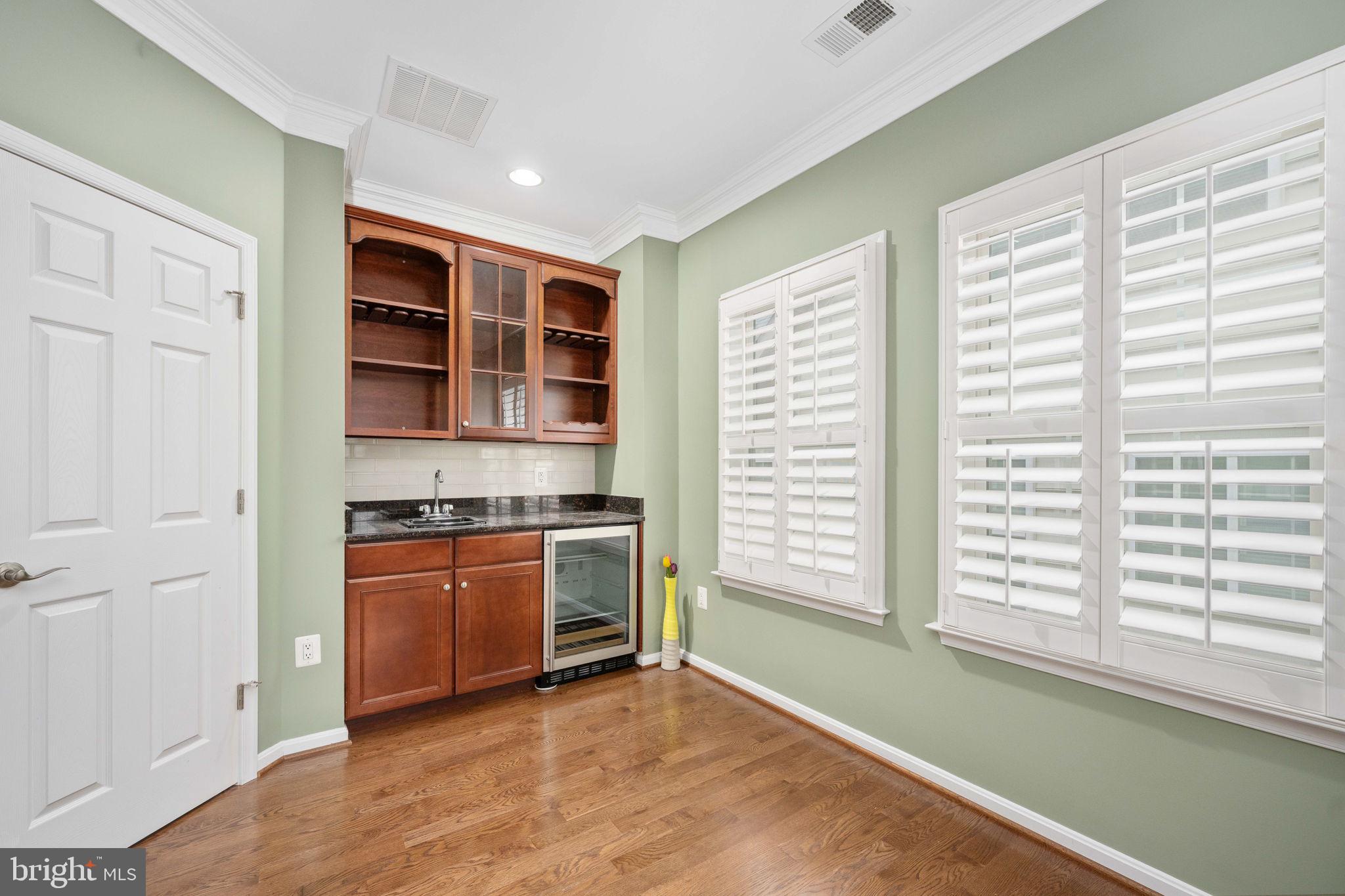 6044 Masondale Road Alexandria, VA 22315 - Photo 45 of 64 a kitchen with stainless steel appliances granite countertop a stove and a sink