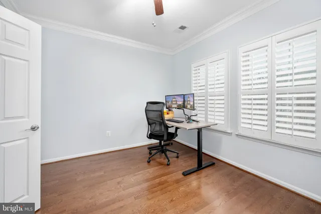 a front view of a house with a glass door