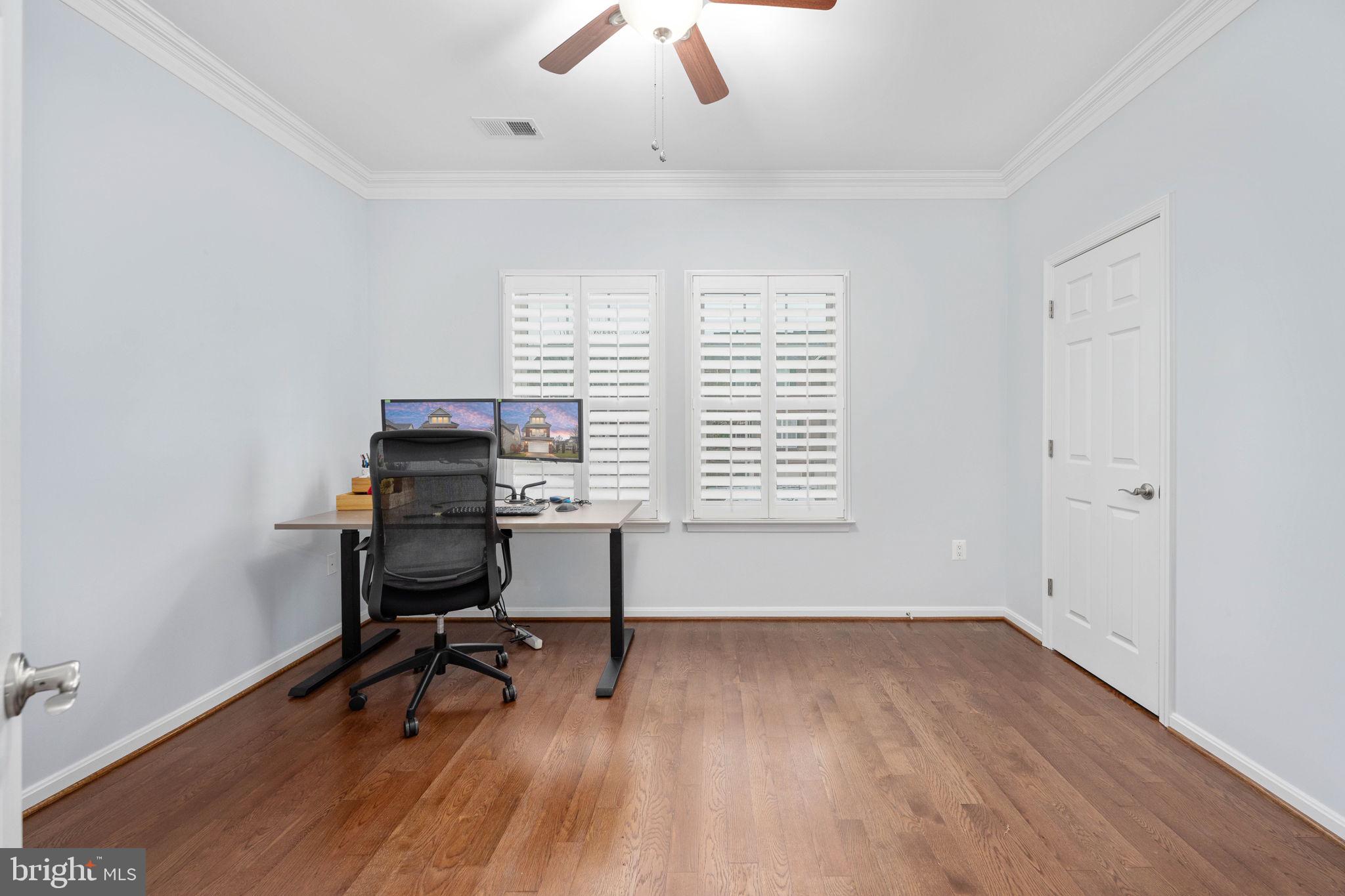 6044 Masondale Road Alexandria, VA 22315 - Photo 47 of 64 a view of a workspace with furniture and a window