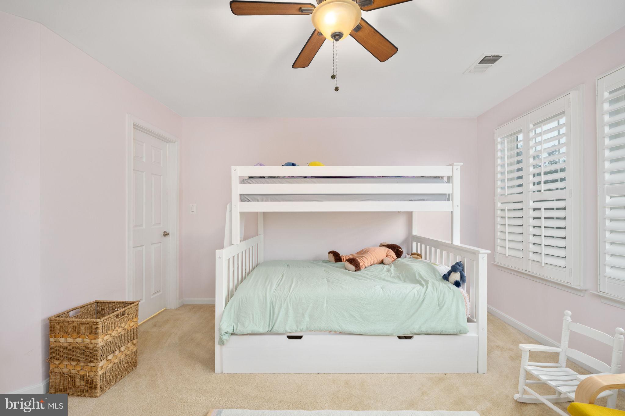 6044 Masondale Road Alexandria, VA 22315 - Photo 50 of 64 a bedroom with a bed and ceiling fan