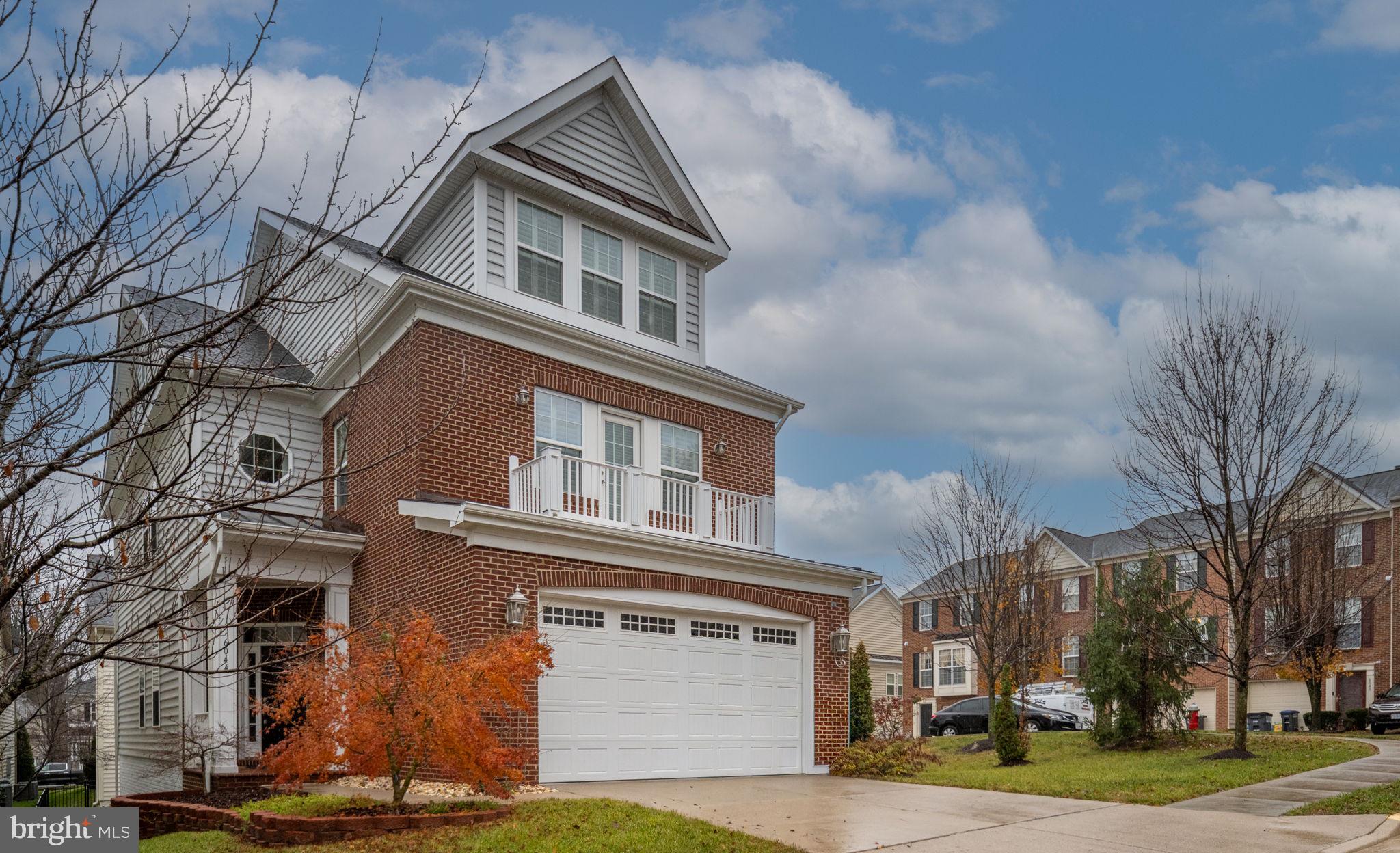 6044 Masondale Road Alexandria, VA 22315 - Photo 57 of 64 a front view of a house with a yard