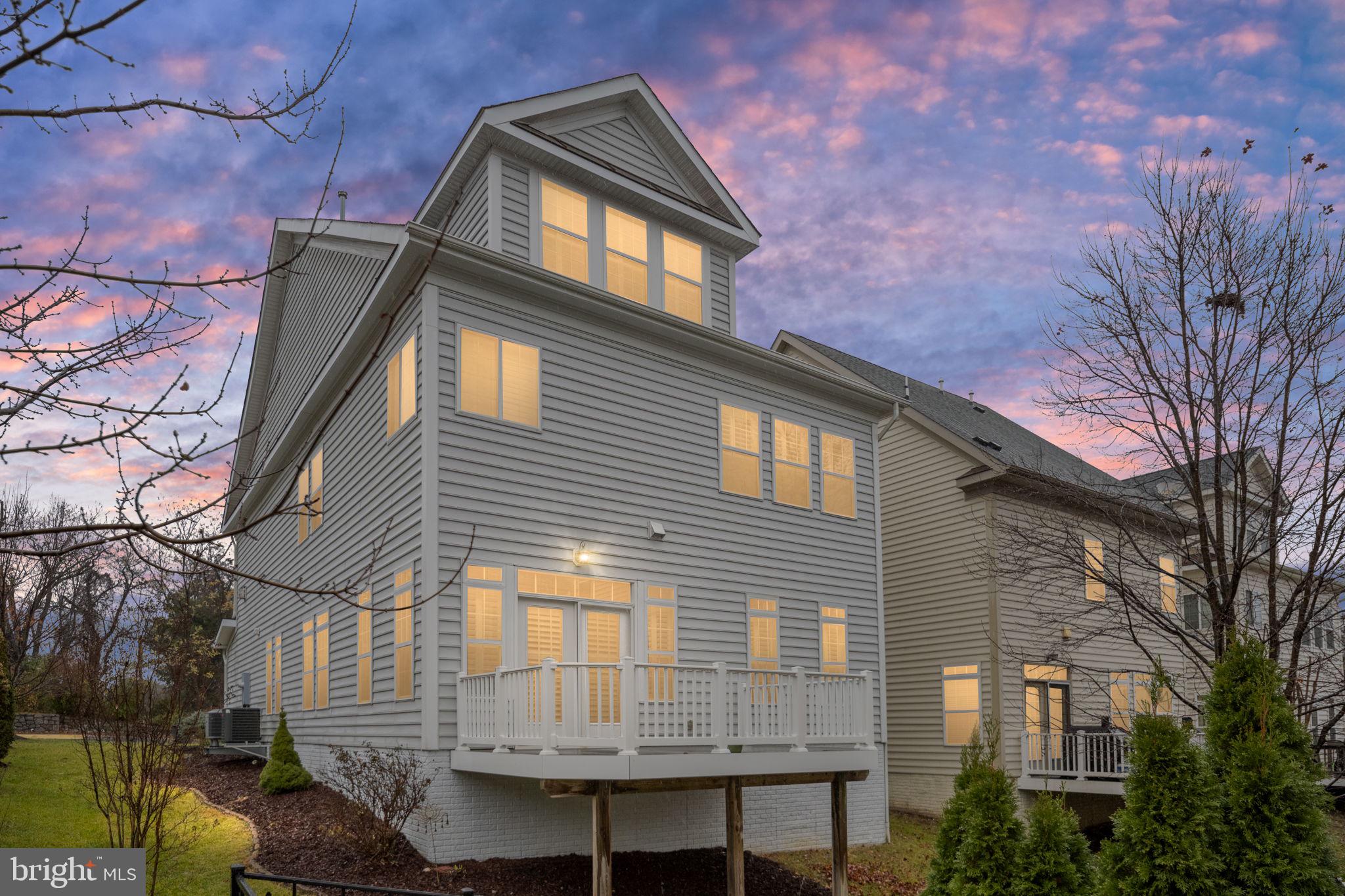 6044 Masondale Road Alexandria, VA 22315 - Photo 58 of 64 a front view of a house with a glass door