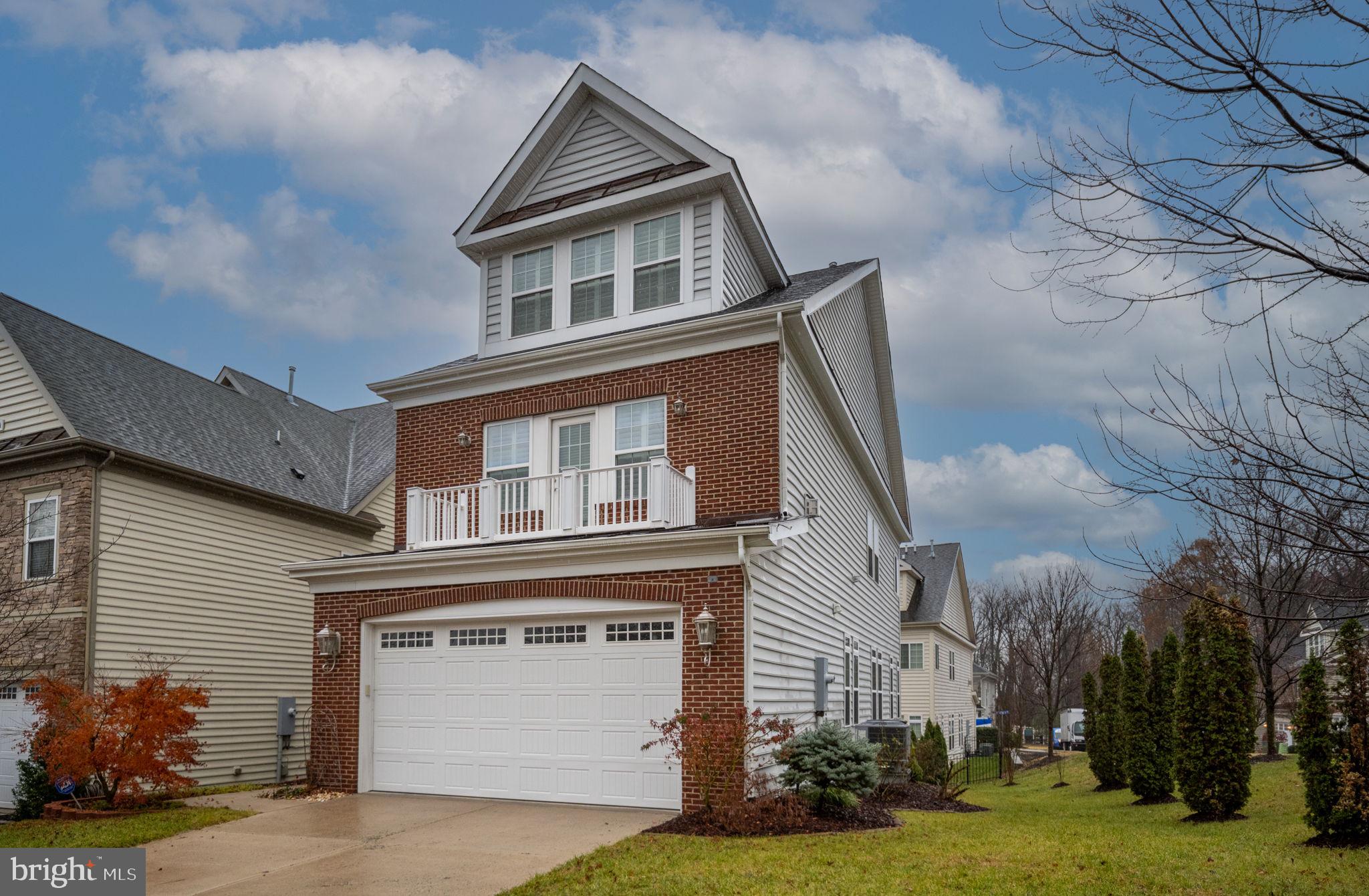 6044 Masondale Road Alexandria, VA 22315 - Photo 59 of 64 a front view of a house with a yard