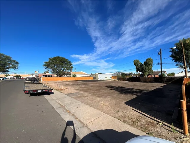 a view of swimming pool from a balcony