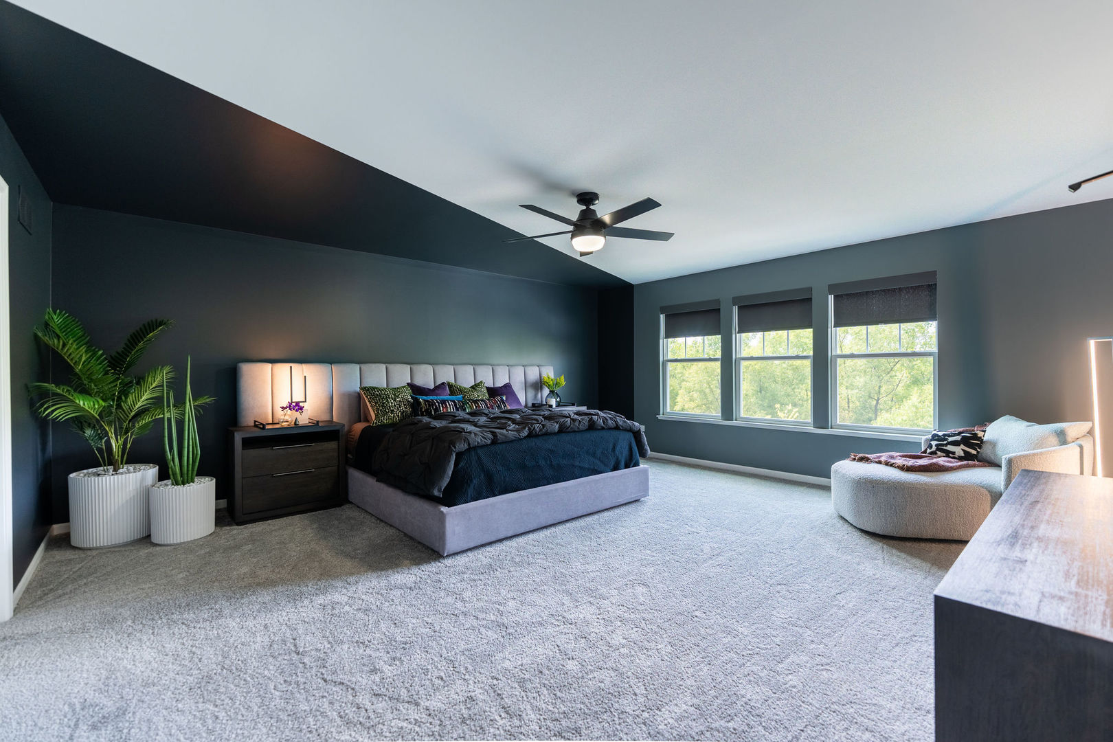 16230 Lake View Road Plainfield, IL 60586 - Photo 35 of 62 a spacious bedroom with a bed and a couch