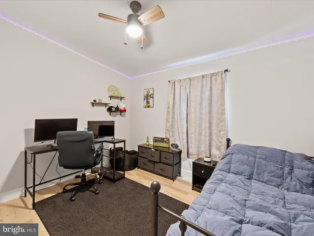 a view of a workspace with furniture