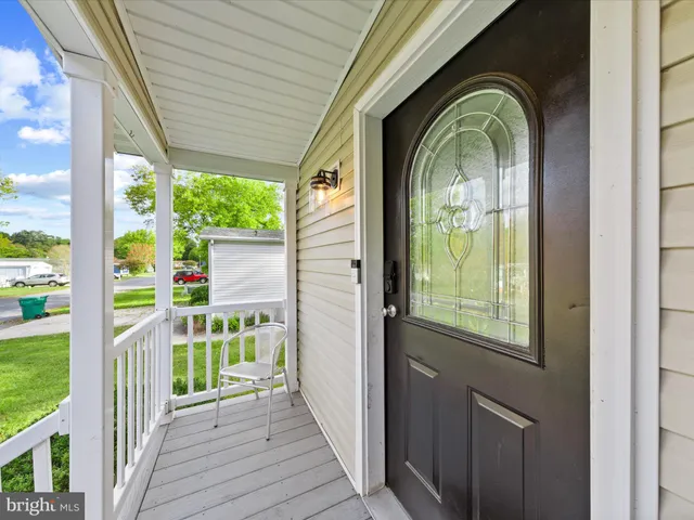 a view of a house with a porch