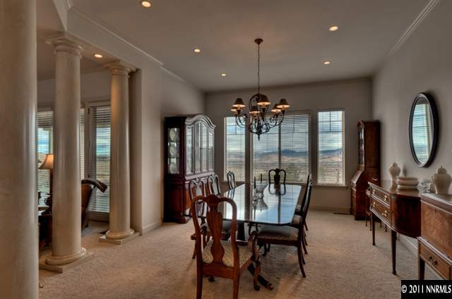 920 Schellbourne Road Reno, NV 89511 - Photo 3 of 13 a view of a dining room with furniture and chandelier