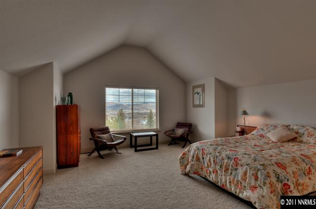920 Schellbourne Road Reno, NV 89511 - Photo 10 of 13 a bedroom with a bed chair and a window