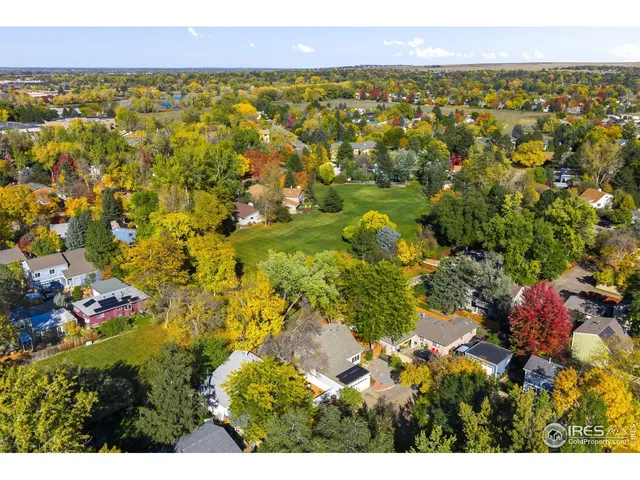 a buildings with trees in front of it