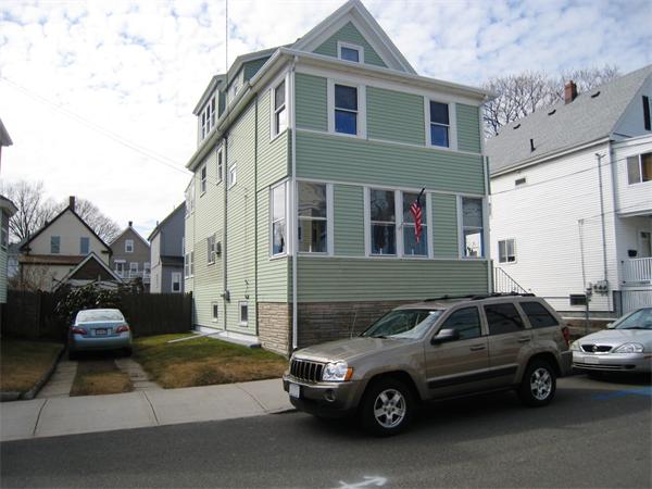 74 Madison Avenue Everett, MA 02149 - Photo 1 of 28 a car parked in front of a house
