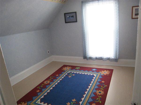 74 Madison Avenue Everett, MA 02149 - Photo 14 of 28 a view of an empty room and window