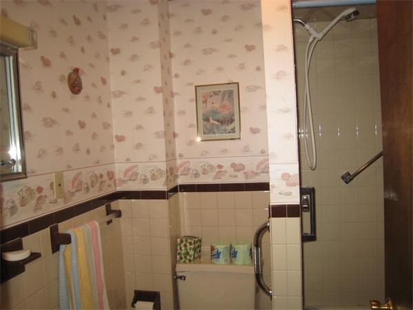 74 Madison Avenue Everett, MA 02149 - Photo 19 of 28 a bathroom with a bathtub and shower