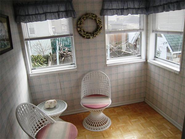 74 Madison Avenue Everett, MA 02149 - Photo 21 of 28 a bathroom with a toilet a sink and a window