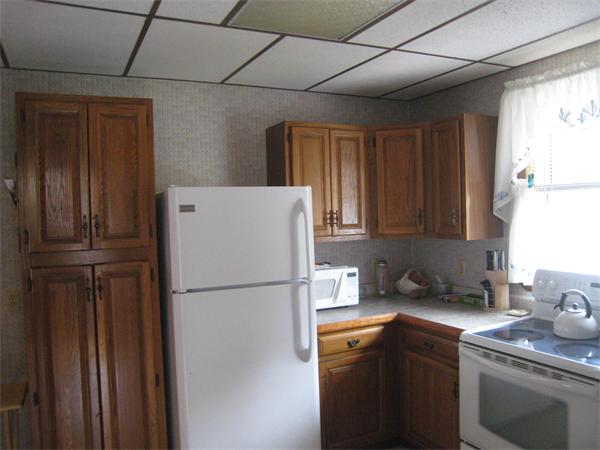 74 Madison Avenue Everett, MA 02149 - Photo 3 of 28 a kitchen with stainless steel appliances granite countertop a refrigerator a sink dishwasher with a stove and a refrigerator